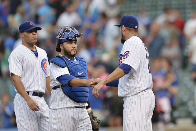 Garza, Rizzo Lead Cubs Past Astros After Delay