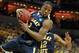 LOUISVILLE, KY - MARCH 17: Isaiah Canaan #3 of the Murray State Racers grabs a rebound in the first half while taking on the Marquette Golden Eagles during the third round of the 2012 NCAA Men's Basketball Tournament at KFC YUM! Center on March 17, 2012 in Louisville, Kentucky. (Photo by Andy Lyons/Getty Images)