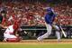 ST. LOUIS, MO - JUNE 21: Nelson Cruz #17 of the Texas Rangers hits the game-winning two-RBI single off of reliever Trevor Rosenthal (not pictured) of the St. Louis Cardinals in the ninth inning at Busch Stadium on June 21, 2013 in St. Louis, Missouri. The Rangers beat the Cardinals 6-4. (Photo by Dilip Vishwanat/Getty Images)
