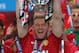 MANCHESTER, ENGLAND - MAY 12: Wayne Rooney of Manchester United lifts the Premier League trophy following the Barclays Premier League match between Manchester United and Swansea City at Old Trafford on May 12, 2013 in Manchester, England. (Photo by Alex Livesey/Getty Images)