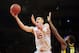 Apr 2, 2013; New York, NY, USA; Maryland Terrapins center Alex Len (25) goes up for a layup over Iowa Hawkeyes center Gabriel Olaseni (0) during the first half of the NIT Tournament semifinal at Madison Square Garden. Mandatory Credit: Joe Camporeale-USA TODAY Sports