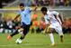 Suarez on the way to goal vs. Tahiti on Sunday