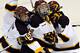 Mobbed by her teammates after scoring the goal that won the 2010 NCAA Frozen Four (Image by Dawn Villela, Associated Press)