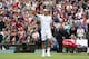 LONDON, ENGLAND - JUNE 24: Roger Federer of Switzerland celebrates match point during his gentlemen's singles first round match against Victor Hanescu of Romania on day one of the Wimbledon Lawn Tennis Championships at the All England Lawn Tennis and Croquet Club on June 24, 2013 in London, England. (Photo by Clive Brunskill/Getty Images)