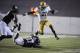 Aug 30, 2012; Houston, TX, USA; UCLA Bruins wide receiver Kenneth Walker (21) runs the ball against the Rice Owls during the second half at Rice Stadium. UCLA beat Rice 49-24. Mandatory Credit: Brendan Maloney-USA TODAY Sports