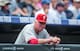 DENVER, CO - JUNE 15: Charlie Manuel #41 of the Philadelphia Phillies looks out from the dugout during a game against the Colorado Rockies at Coors Field on June 15, 2013 in Denver, Colorado. The Rockies led 6-1 after one inning. (Photo by Dustin Bradford/Getty Images)