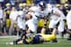 November 10, 2012; Ann Arbor, MI, USA; Northwestern Wildcats quarterback Kain Colter (2) runs the ball against the Michigan Wolverines in the first quarter at Michigan Stadium. Mandatory Credit: Rick Osentoski-USA TODAY Sports