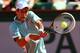 PARIS, FRANCE - JUNE 07: Novak Djokovic of Serbia plays a backhand during the men's singles semi-final match against Rafael Nadal of Spain on day thirteen of the French Open at Roland Garros on June 7, 2013 in Paris, France. (Photo by Julian Finney/Getty Images)