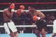 27 JUN 1988: HEAVYWEIGHT CHAMPION MIKE TYSON THROWS A RIGHT AT CHALLENGER MICHAEL SPINKS DURING THEIR HEAVYWEIGHT TITLE FIGHT IN ATLANTIC CITY, NEW JERSEY. TYSON STOPPED SPINKS WITH A KNOCK OUT IN THE FIRST ROUND, WINNING THE FIGHT IN 91 SECONDS TO RETAIN HIS TITLE. Mandatory Credit: Simon Bruty/ALLSPORT