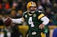 GREEN BAY, WI - JANUARY 20: Quarterback Brett Favre #4 of the Green Bay Packers throws the ball in the first quarter against the New York Giants during the NFC championship game on January 20, 2008 at Lambeau Field in Green Bay, Wisconsin. (Photo by Jonathan Ferrey/Getty Images)
