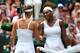 LONDON, ENGLAND - JUNE 25: Serena Williams of the United States of America shakes hands at the net with Mandy Minella of Luxembourg after their Ladies' Singles first round match on day two of the Wimbledon Lawn Tennis Championships at the All England Lawn Tennis and Croquet Club on June 25, 2013 in London, England. (Photo by Julian Finney/Getty Images)