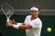 LONDON, ENGLAND - JUNE 24: Rafael Nadal of Spain hits a backhand during his Gentlemen's Singles first round match against Steve Darcis of Belgium on day one of the Wimbledon Lawn Tennis Championships at the All England Lawn Tennis and Croquet Club on June 24, 2013 in London, England. (Photo by Mike Hewitt/Getty Images)