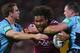 BRISBANE, AUSTRALIA - JUNE 26: Sam Thaiday of the Maroons is tackled by Ryan Hoffman and Paul Gallen of the Blues during game two of the ARL State of Origin series between the Queensland Maroons and the New South Wales Blues at Suncorp Stadium on June 26, 2013 in Brisbane, Australia. (Photo by Chris Hyde/Getty Images)