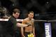 Jan 26, 2013; Chicago, IL, USA; An official calls off the fight between Anthony Pettis (black shorts) and Donald Cerrone (bottom) during UFC on FOX 6 at the United Center. Mandatory Credit: David Banks-USA TODAY Sports