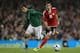 DUBLIN, IRELAND - OCTOBER 11: Keith Fahey (L) of Republic of Ireland chases Henrikh Mkhitaryan (R) of Armenia during the EURO 2012 Group B qualifying match between the Republic of Ireland and Armenia at the Aviva Stadium on October 11, 2011 in Dublin, Ireland. (Photo by Michael Steele/Getty Images)