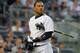 NEW YORK, NY - JUNE 20: Robinson Cano #24 of the New York Yankees walks back to the dugout after striking out in the fourth inning against the Tampa Bay Rays at Yankee Stadium on June 20, 2013 in the Bronx borough of New York City. (Photo by Mike Stobe/Getty Images)