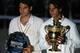 Roger Federer and Rafael Nadal hold up their hardware after contesting one of the most memorable Grand Slam finals in 2008 at Wimbledon.