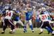 Nov 22, 2012; Detroit, MI, USA; Detroit Lions quarterback Matthew Stafford (9) throws a pass in the fourth quarter of the Thanksgiving day game against the Houston Texans at Ford Field. Mandatory Credit: Andrew Weber-USA TODAY Sports