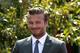 BEIJING, CHINA - JUNE 17: David Beckham looks a bee fly during his speech at Soong Ching Ling's Former Residence on June 17, 2013 in Beijing, China. Beckham has donated his jersey and his wife Victoria Jaguar F-Type Sport car to the Soong Ching Ling Foundation to sell them for a charity in China.(Photo by Lintao Zhang/Getty Images)