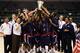 AUCKLAND, NEW ZEALAND - JULY 12: USA celebrate after winning the U19 Basketball World Championships Final match between Greece and the United States of America at North Shore Events Centre on July 12, 2009 in Auckland, New Zealand. (Photo by Sandra Mu/Getty Images)