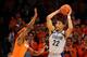 NEW YORK, NY - MARCH 15: Otto Porter Jr. #22 of the Georgetown Hoyas looks to pass against C.J. Fair #5 of the Syracuse Orange during the semifinals of the Big East Men's Basketball Tournament at Madison Square Garden on March 15, 2013 in New York City. (Photo by Al Bello/Getty Images)