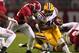 Nov 5, 2011; Tuscaloosa, AL, USA; LSU Tigers running back Michael Ford (42) is hit by Alabama Crimson Tide linebacker Nico Johnson (35) during the first half at Bryant Denny Stadium. Mandatory Credit: Marvin Gentry-USA TODAY Sports