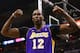 SAN ANTONIO, TX - APRIL 24: Dwight Howard #12 of the Los Angeles Lakers reacts after being fouled against the San Antonio Spurs during Game Two of the Western Conference Quarterfinals of the 2013 NBA Playoffs at AT&T Center on April 24, 2013 in San Antonio, Texas. NOTE TO USER: User expressly acknowledges and agrees that, by downloading and or using this photograph, User is consenting to the terms and conditions of the Getty Images License Agreement. (Photo by Ronald Martinez/Getty Images)