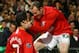 MANCHESTER, UNITED KINGDOM - MARCH 11: Cristiano Ronaldo of Manchester United is congratulated by team mate Wayne Rooney after scoring his team's second goal during the UEFA Champions League Round of Sixteen, Second Leg match between Manchester United and Inter Milan at Old Trafford on March 11, 2009 in Manchester, England. (Photo by Alex Livesey/Getty Images)