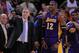 December 22, 2012; Oakland, CA, USA; Los Angeles Lakers head coach Mike D'Antoni (left) and center Dwight Howard (12) react after Howard fouled out during the overtime quarter against the Golden State Warriors at ORACLE Arena. The Lakers defeated the Warriors 118-115 in overtime. Mandatory Credit: Kyle Terada-USA TODAY Sports