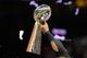 Feb 3, 2013; New Orleans, LA, USA; Baltimore Ravens linebacker Ray Lewis (52) hoists the Vince Lombardi trophy after Super Bowl XLVII against the San Francisco 49ers at the Mercedes-Benz Superdome. The Ravens defeated the 49ers 34-31. Mandatory Credit: Kirby Lee-USA TODAY Sports