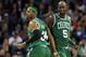 CHARLOTTE, NC - FEBRUARY 11: Teammates Paul Pierce #34 and Kevin Garnett #5 of the Boston Celtics react after a basket against the Charlotte Bobcats during their game at Time Warner Cable Arena on February 11, 2013 in Charlotte, North Carolina. NOTE TO USER: User expressly acknowledges and agrees that, by downloading and or using this photograph, User is consenting to the terms and conditions of the Getty Images License Agreement. (Photo by Streeter Lecka/Getty Images)