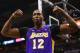SAN ANTONIO, TX - APRIL 24: Dwight Howard #12 of the Los Angeles Lakers reacts after being fouled against the San Antonio Spurs during Game Two of the Western Conference Quarterfinals of the 2013 NBA Playoffs at AT&T Center on April 24, 2013 in San Antonio, Texas. NOTE TO USER: User expressly acknowledges and agrees that, by downloading and or using this photograph, User is consenting to the terms and conditions of the Getty Images License Agreement. (Photo by Ronald Martinez/Getty Images)
