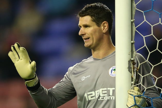 POLLITT EXTENDS STAY at LATICS