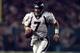 21 Dec 1998: Quarterback John Elway #7 of the Denver Broncos in action during the game against the Miami Dolphins at Pro Player Stadium in Miami, Florida. The Dolphins defeated the Broncos 31-21. Mandatory Credit: Andy Lyons /Allsport
