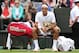 LONDON, ENGLAND - JUNE 24: Roger Federer of Switzerland takes a break during his gentlemen's singles first round match against Victor Hanescu of Romania on day one of the Wimbledon Lawn Tennis Championships at the All England Lawn Tennis and Croquet Club on June 24, 2013 in London, England. (Photo by Clive Brunskill/Getty Images)