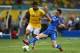 SALVADOR, BRAZIL - JUNE 22: Hulk of Brazil competes with Mattia De Sciglio of Italy during the FIFA Confederations Cup Brazil 2013 Group A match between Italy and Brazil at Estadio Octavio Mangabeira (Arena Fonte Nova Salvador) on June 22, 2013 in Salvador, Brazil. (Photo by Clive Mason/Getty Images)