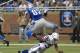 DETROIT, MI - DECEMBER 02: Brandon Pettigrew #87 of the Detroit Lions leaps over the tackle attempt of Joel Lefeged #35 of the Indianapolis Colts at Ford Field on December 2, 2012 in Detroit, Michigan. (Photo by Dave Reginek/Getty Images)