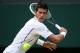 LONDON, ENGLAND - JUNE 29: Novak Djokovic of Serbia plays a backhand during the Gentlemen's Singles third round match against Jeremy Chardy of France on day six of the Wimbledon Lawn Tennis Championships at the All England Lawn Tennis and Croquet Club on June 29, 2013 in London, England. (Photo by Clive Brunskill/Getty Images)
