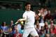 LONDON, ENGLAND - JUNE 29: Novak Djokovic of Serbia plays a forehand during the Gentlemen's Singles third round match against Jeremy Chardy of France on day six of the Wimbledon Lawn Tennis Championships at the All England Lawn Tennis and Croquet Club on June 29, 2013 in London, England. (Photo by Clive Brunskill/Getty Images)
