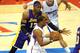 January 4, 2013; Los Angeles, CA, USA; Los Angeles Lakers center Dwight Howard (12) guards Los Angeles Clippers point guard Chris Paul (3) as he gets set to pass to power forward Blake Griffin (32) during the game against the Los Angeles Lakers at the Staples Center. Clippers won 107-102. Mandatory Credit: Jayne Kamin-Oncea-USA TODAY Sports