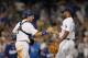 LOS ANGELES, CA - JUNE 26: Catcher A.J. Ellis #17 and pitcher Kenley Jansen #74 of the Los Angeles Dodgers celebrate their 4-2 victory against the San Francisco Giants in their MLB game at Dodger Stadium on June 26, 2013 in Los Angeles, California. (Photo by Victor Decolongon/Getty Images)