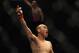 Tiequan Zhang, the UFC's first Chinese fighter, celebrates his only UFC win at UFC 127.