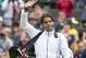 Jun 24, 2013; London, United Kingdom; Rafael Nadal (ESP) waves to the crowd after his match against Steve Darcis (BEL) on day one of the 2013 Wimbledon Championships at the All England Lawn Tennis Club. Mandatory Credit: Susan Mullane-USA TODAY Sports