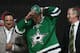 NEWARK, NJ - JUNE 30: Valeri Nichushkin puts on his hat and jersey after being selected number ten over all in the first round by the Dallas Stars during the 2013 NHL Draft at the Prudential Center on June 30, 2013 in Newark, New Jersey. (Photo by Bruce Bennett/Getty Images)