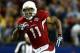 TAMPA, FL - FEBRUARY 01: Wide receiver Larry Fitzgerald #11 of the Arizona Cardinals scores a 64-yard touchdown reception in the fourth quarter against the Pittsburgh Steelers during Super Bowl XLIII on February 1, 2009 at Raymond James Stadium in Tampa, Florida. (Photo by Chris McGrath/Getty Images)