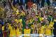 RIO DE JANEIRO, BRAZIL - JUNE 30: Thiago Silva of Brazil celebrates with trophy alongside team mates after victory in the FIFA Confederations Cup Brazil 2013 Final match between Brazil and Spain at Maracana on June 30, 2013 in Rio de Janeiro, Brazil. (Photo by Laurence Griffiths/Getty Images)