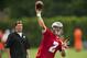 May 20, 2013; Philadelphia, PA, USA; Philadelphia Eagles fourth round draft pick quarterback Matt Barkley (2) passes the ball as quarterbacks coach Bill Lazor looks on during organized team activities at the NovaCare Complex. Mandatory Credit: Howard Smith-USA TODAY Sports