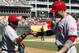 Jun 30, 2013; Arlington, TX, USA; Cincinnati Reds manager Dusty Baker (12) congratulates first baseman Joey Votto (19) after scoring a run against the Texas Rangers in the eighth inning at the Rangers Ballpark in Arlington. The Rangers won 3-2. Mandatory Credit: Jim Cowsert-USA TODAY Sports