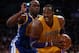 LOS ANGELES, CA - NOVEMBER 09: Dwight Howard #12 of the Los Angeles Lakers is defended by Carl Landry #7 of the Golden State Warriors in the first half at Staples Center on November 9, 2012 in Los Angeles, California. The Lakers defeated the Warriors 101-77. NOTE TO USER: User expressly acknowledges and agrees that, by downloading and or using this photograph, User is consenting to the terms and conditions of the Getty Images License Agreement. (Photo by Jeff Gross/Getty Images)