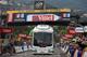 BASTIA, FRANCE - JUNE 29: The Orica-Greenedge team bus collides with the finishing banner prior to the race arriving at the end of stage one of the 2013 Tour de France, a 213KM road stage from Porto-Vecchio to Bastia, on June 29, 2013 in Bastia, France. The 100th edition of Le Tour de France begins in Porto Vecchio on the island of Corsica and ends July 21 in Paris. (Photo by Doug Pensinger/Getty Images)